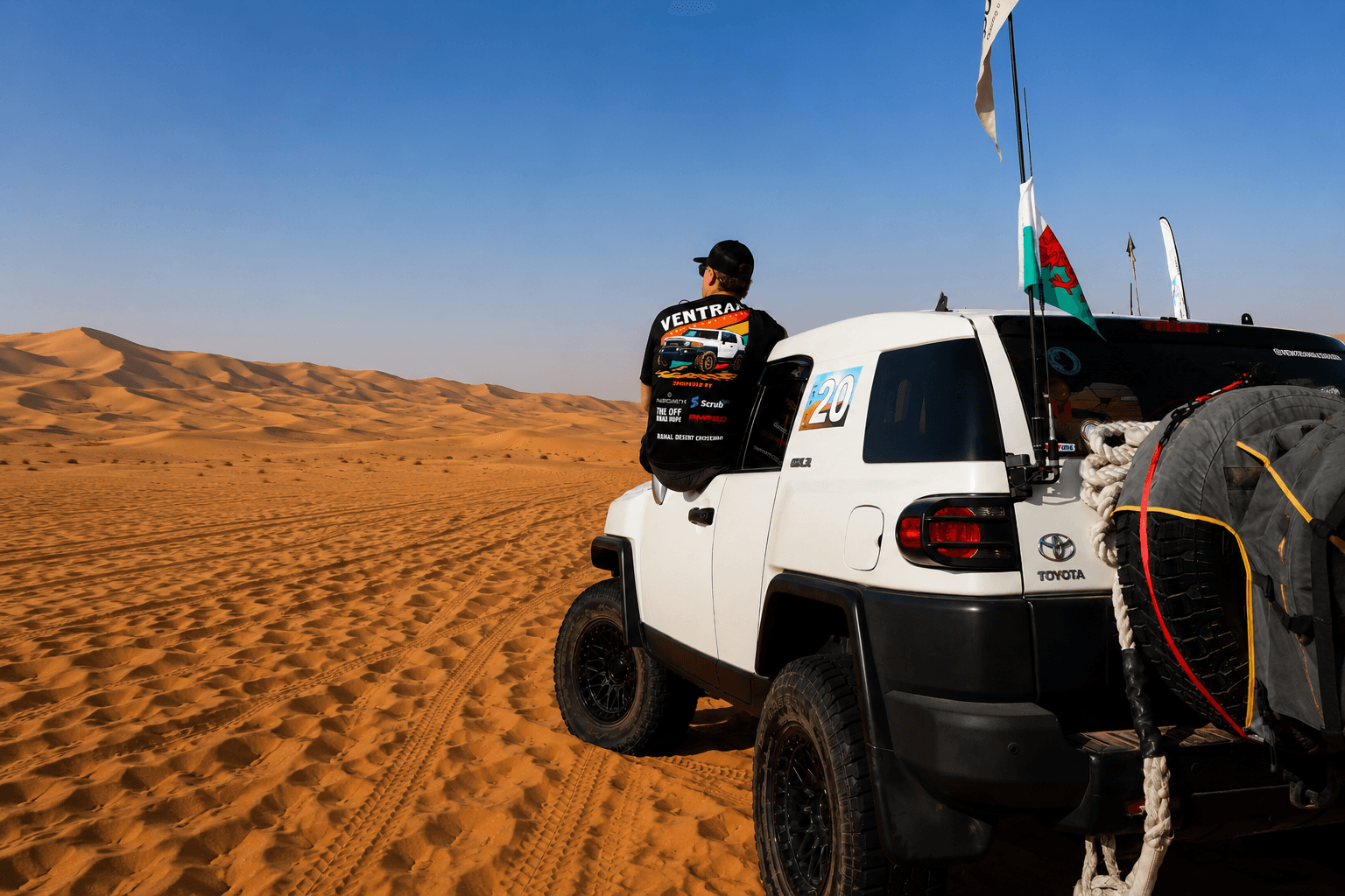 Declan Jones with FJ Cruiser in the UAE desert dunes