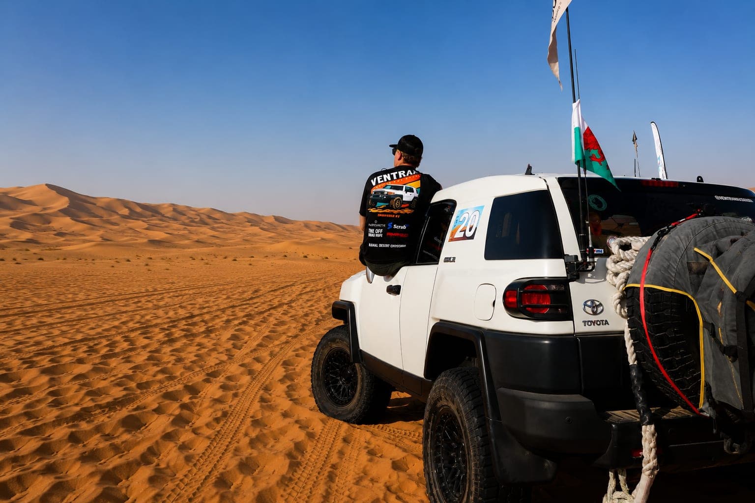 Declan Jones with FJ Cruiser in the UAE desert dunes